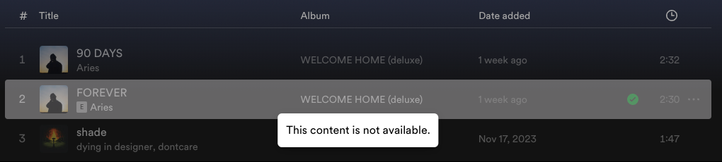 A screenshot of 3 grayed out songs on Spotify with a popup "This Content is not available."