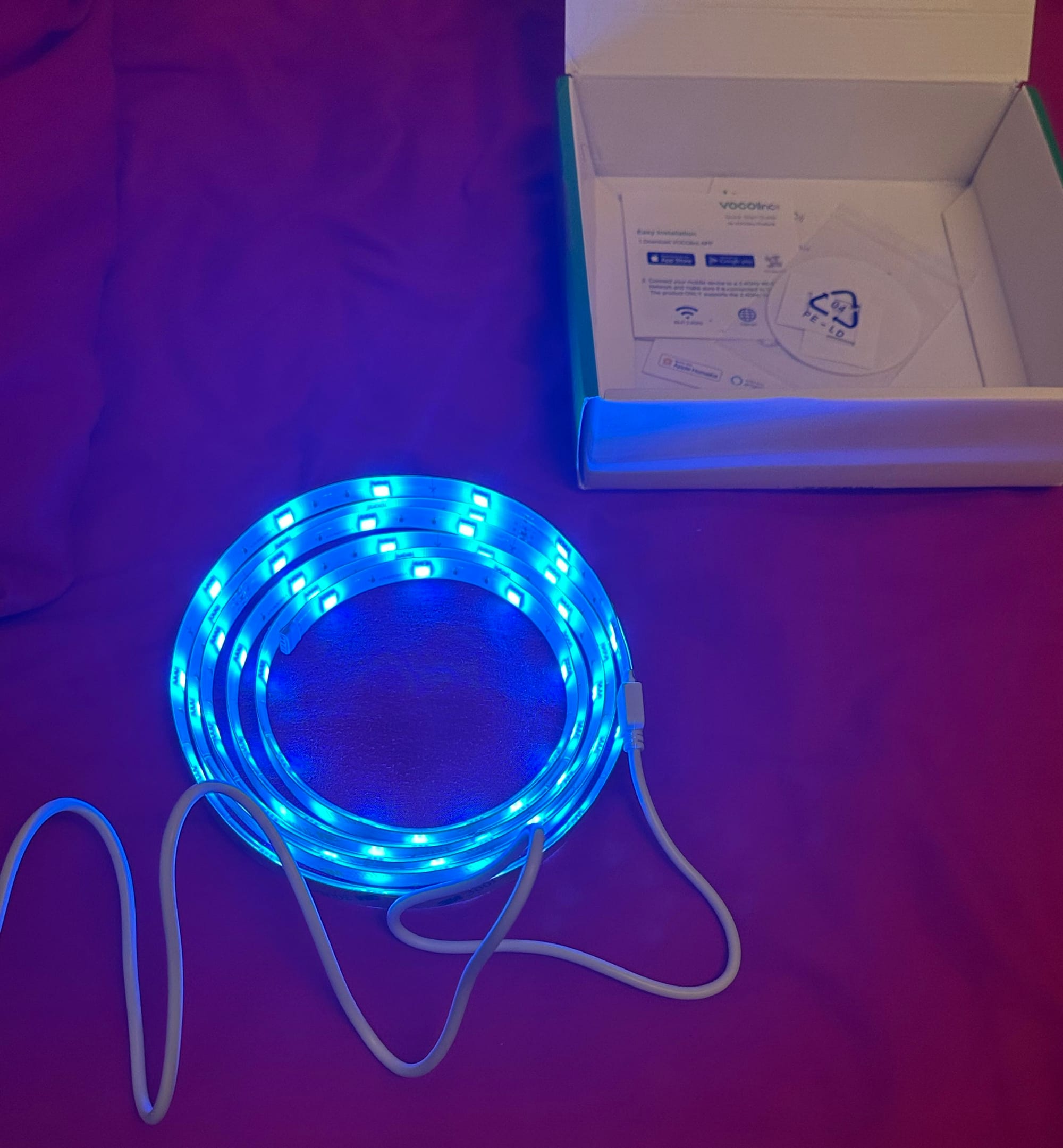 A picture of the light strip glowing blue.